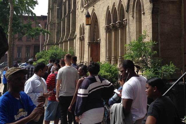 New Yorkers waiting on line to resolve their summonses for minor offenses last June